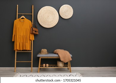 Hallway interior with stylish furniture, clothes and accessories - Powered by Shutterstock