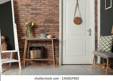 Hallway Interior With Stylish Table And Mirror