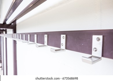 In The Hallway Of The School Hangs A Coat Rack On The Wall