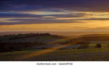 Halnaker, UK - January 9, 2020:  Winter Sunset Over Halnaker Hill From Selhurst Park, South Downs National Park