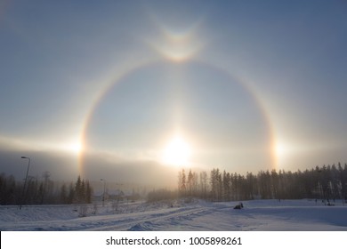 Halo effect in Finland during a winter morning. Sunny and glittering light. Cold weather. - Shutterstock ID 1005898261
