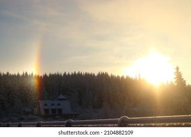 Halo, hall phenomenon, light phenomenon in the mountain landscape near the Bedřichov reservoir