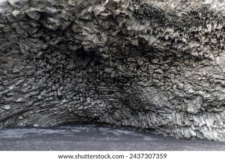 Halsanefshellir cave made of basalt columns on Reynisfjara Black sand beach, Iceland, inside view of the cave.