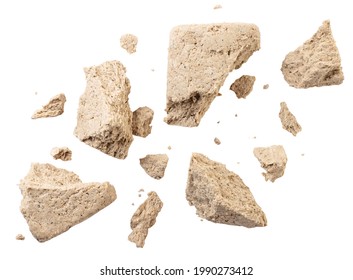 Halva pieces are flying close-up on a white background. Isolated