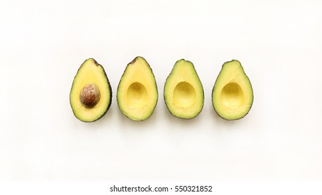 Halved Avocado On White Background