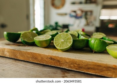 Halved Limes On Cutting Board For Making Margaritas