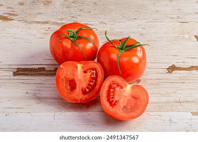 Halved Tomato on Rustic Wooden Surface - Powered by Shutterstock