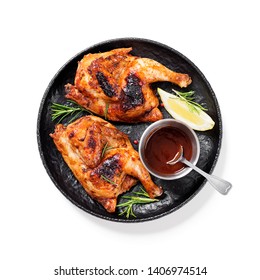 Halves Of Appetizing Grilled Juicy Chicken With Golden Brown Crust Served With Lemon Slices,barbeque  Sauce And Rosemary. Isolated On White Background