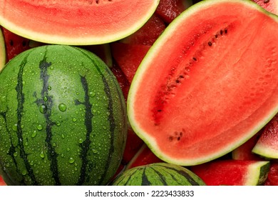 Halves of juicy ripe watermelon as background, top view - Powered by Shutterstock