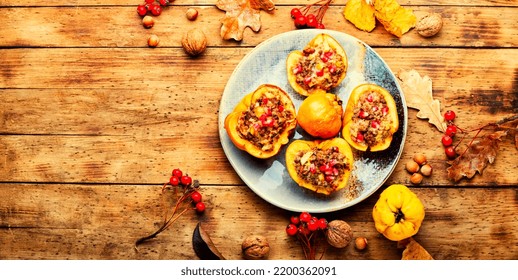 Halves quince stuffed with minced meat. Autumn recipe. Flat lay with copy space - Powered by Shutterstock