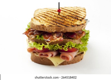 Ham And Bacon Club Sandwich On A White Background