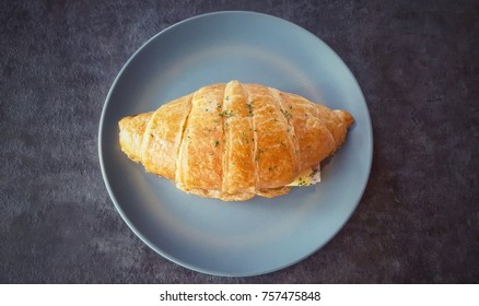 Ham and cheese croissant on table - Shutterstock ID 757475848