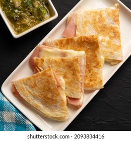 Ham and cheese quesadilla with flour tortilla. Traditional mexican food