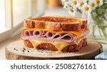 Ham and Cheese Sandwich: A classic sandwich with layers of savory ham and creamy cheese between slices of bread, often toasted or grilled for added warmth and crunch.