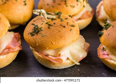 Ham And Cheese Sliders On Homemade Dinner Rolls.