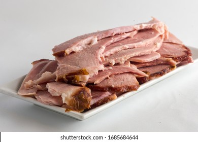 Ham. Cured Country Ham. Classic Delicatessen Or Butcher Shop Staple. Whole Ham, Carved With A Butchers Knife. Lunch Or Dinner Favorite, Meat Ideal For Sandwiches Or Served With Vegetables