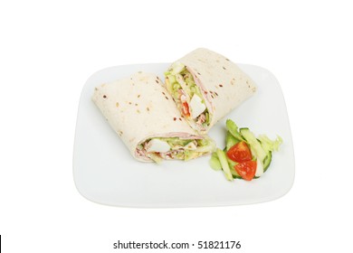 Ham And Egg Salad Bread Wraps On A Plate