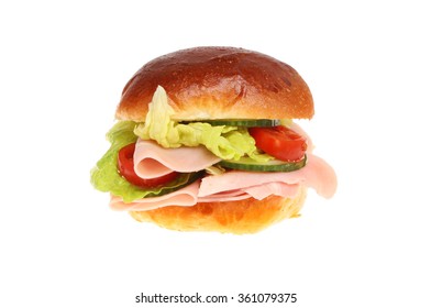 Ham And Salad In A Brioche Roll Isolated Against White