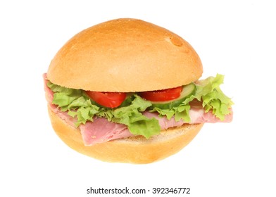 Ham And Salad In A Crusty Bread Roll Isolated Against White