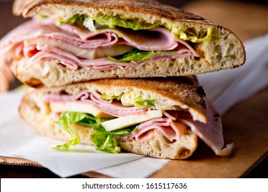 Ham Sandwich. Country Ham And Swiss Cheese. Classic Delicatessen Sandwich. Whole Ham, Carved With A Butchers Knife. Lunch Or Dinner Favorite, Meat Ideal For Sandwiches Or Served With Vegetables.