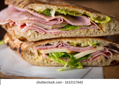 Ham Sandwich. Country Ham And Swiss Cheese. Classic Delicatessen Sandwich. Whole Ham, Carved With A Butchers Knife. Lunch Or Dinner Favorite, Meat Ideal For Sandwiches Or Served With Vegetables.