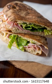 Ham Sandwich. Country Ham And Swiss Cheese. Classic Delicatessen Sandwich. Whole Ham, Carved With A Butchers Knife. Lunch Or Dinner Favorite, Meat Ideal For Sandwiches Or Served With Vegetables.