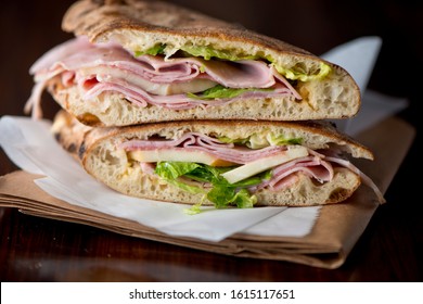 Ham Sandwich. Country Ham And Swiss Cheese. Classic Delicatessen Sandwich. Whole Ham, Carved With A Butchers Knife. Lunch Or Dinner Favorite, Meat Ideal For Sandwiches Or Served With Vegetables.