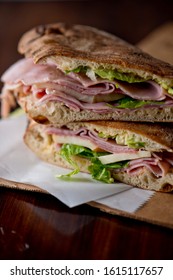 Ham Sandwich. Country Ham And Swiss Cheese. Classic Delicatessen Sandwich. Whole Ham, Carved With A Butchers Knife. Lunch Or Dinner Favorite, Meat Ideal For Sandwiches Or Served With Vegetables.