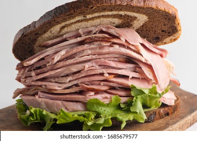 Ham Sandwich. Country Ham And Swiss Cheese. Classic Delicatessen Sandwich. Whole Ham, Carved With A Butchers Knife. Lunch Or Dinner Favorite, Meat Ideal For Sandwiches Or Served With Vegetables.