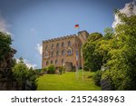 Hambach castle with flags on a beautiful summer day near Neustadt an der Weinstrasse, Germany