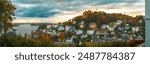 Hamburg, Blankenese, city district, panoramic view over the river Elbe and Süllberg hill at sunset in autumn before sunset