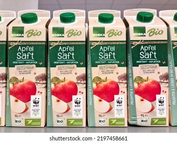 Hamburg, Germany - 03 September 2022: Apple Juice Tetrapacks Of The Edeka Private Label On A Supermarket Shelf
