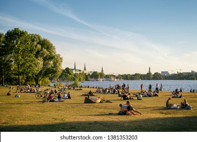 HAMBURG, GERMANY - 12.07.2018
Hamburg Public Area With Relaxing People On Meadow