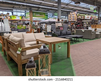 Hamburg, Germany 1.2.2022 Outdoor Furniture For Sale In Home Depot Store. Patio Furniture With Couch And Wooden Table In Large Home Decor Store