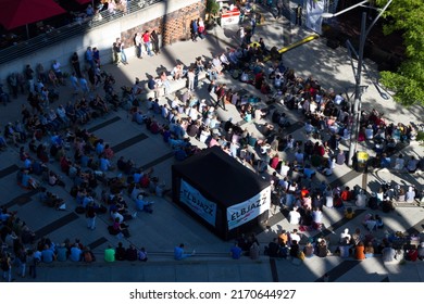 Hamburg, Germany 12.5.2022 Large Crowd Sitting In Outdoor Music Festival. Aerial Top Down View Of People Enjoying Jazz Music Festival