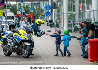 Hamburg, Germany, 2021, October, 28, A Friendly Policeman Has A Heart For Children