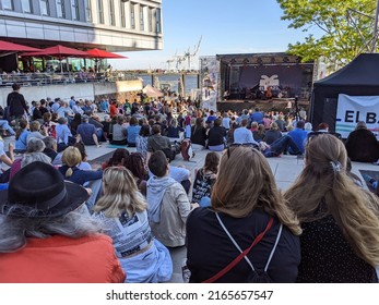 Hamburg, Germany 5.6.2022 People Enjoying Outdoor Jazz Concert. Spectators Watching Music Festival In Outdoor Area