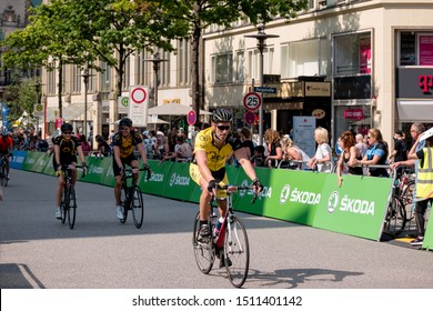 HAMBURG, GERMANY – AUGUST 25, 2019: Cyclists At The 2019 Euroeyes Cyclassics Bike Race Watched By Street Spectators