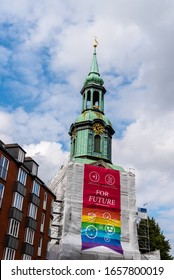 Hamburg, Germany - August 4, 2019: Holy Trinity Church (Hl.-Dreieinigkeits-Kirche) In St. Georg Quarter With Gay Rainbow Flag In The Tower