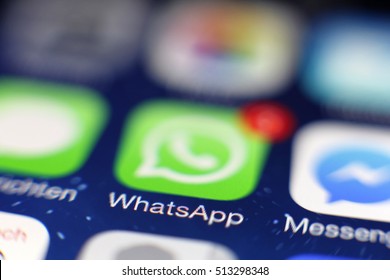 HAMBURG, GERMANY - December 2013: WhatsApp Application On Screen Of An IPhone