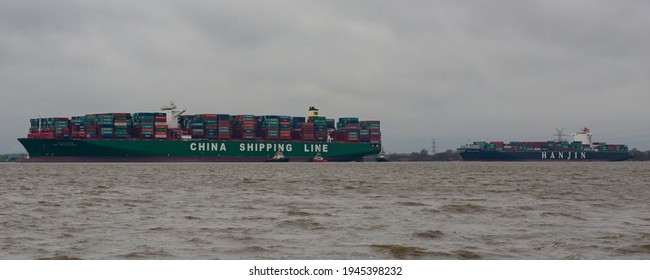 Hamburg, Germany - February 06: Container ship CSCL Indian Ocean China Shipping Line ran aground on the Elbe near Hamburg and the HANJIN Long Beach drove by