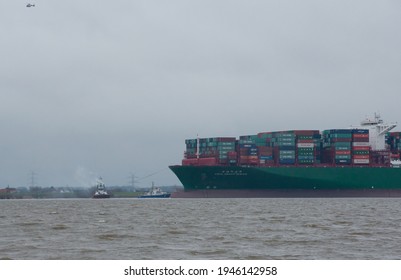 Hamburg, Germany - February 06: Container ship CSCL Indian Ocean China Shipping Line ran aground on the Elbe near Hamburg