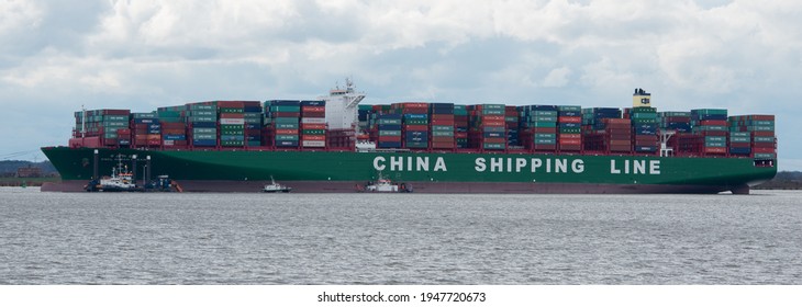 Hamburg, Germany - February 06: Container ship CSCL Indian Ocean China Shipping Line on the Elbe near Hamburg on the way to the Port of Hamburg container terminal