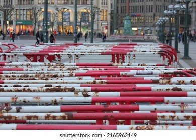 Hamburg, Germany - February 2018: a lot of red and white crush barriers  gathered in the main square of Hamburg after a big event in northern Germany