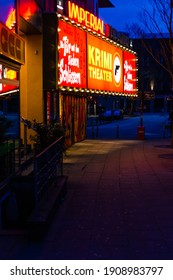 Hamburg, Germany - January 23, 2021 Half Broken Neon Sign Of The Imperial Theater On The Reeperbahn Staying Lit During Lockdown