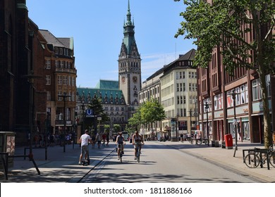 Hamburg, Germany - June 30, 2019: People cycling in the main shopping street Monckebergstrasse of Hamburg, Germany on June 30, 2019