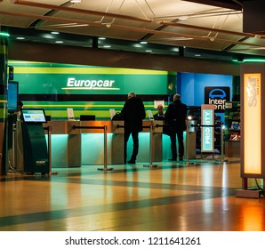 HAMBURG, GERMANY - MAR 20, 2018: Customers at europcar desk at Hamburg airport terminal
