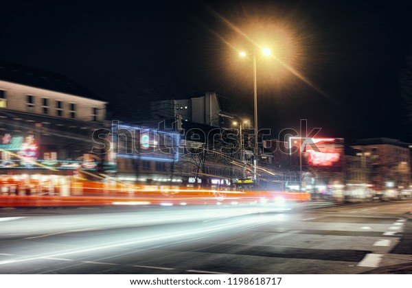 HAMBURG GERMANY\
Nightlife Streets building night time exposure Europe party traffic\
red dancing drinking\
vintage