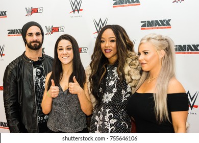 Hamburg, Germany - November 10, 2017: Group  Foto with The WWE Superstars Seth Rollins, Bayley, Dana Brooke and Alice Fox with Chief Steffen Henssler on the Red Carpet Event during WWE Live Tour 2017