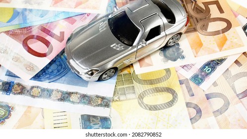 HAMBURG, GERMANY, NOVEMBER 24 - 2021: Car Insurance On Banknotes. Quick And Easy Compare Car Insurance To Find Cheapest.